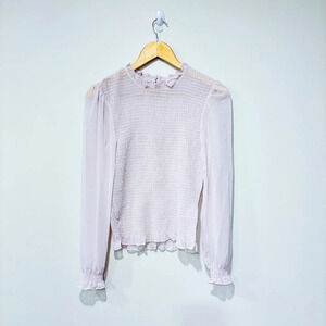 Q + A LOS ANGELES Lilac  ruffle top with sheer sleeves